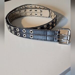 Grommet faux leather belt color black